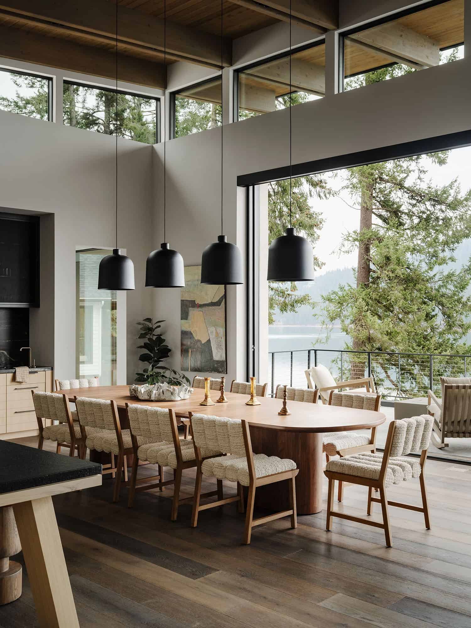 contemporary dining room with lake views