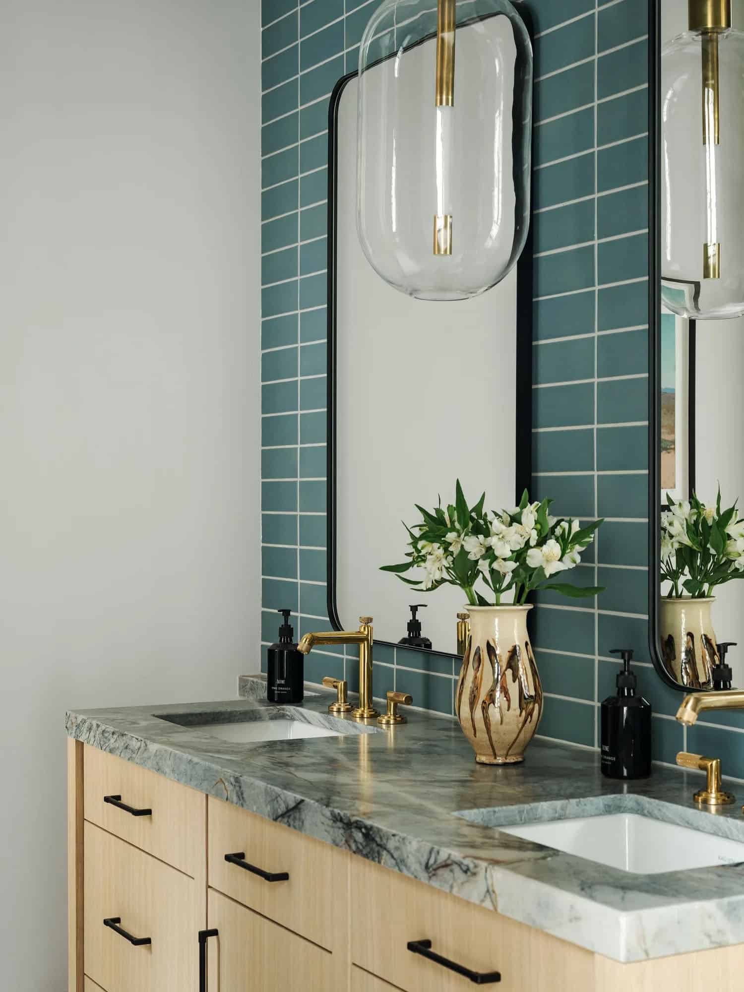 contemporary bathroom with blue wall tiles