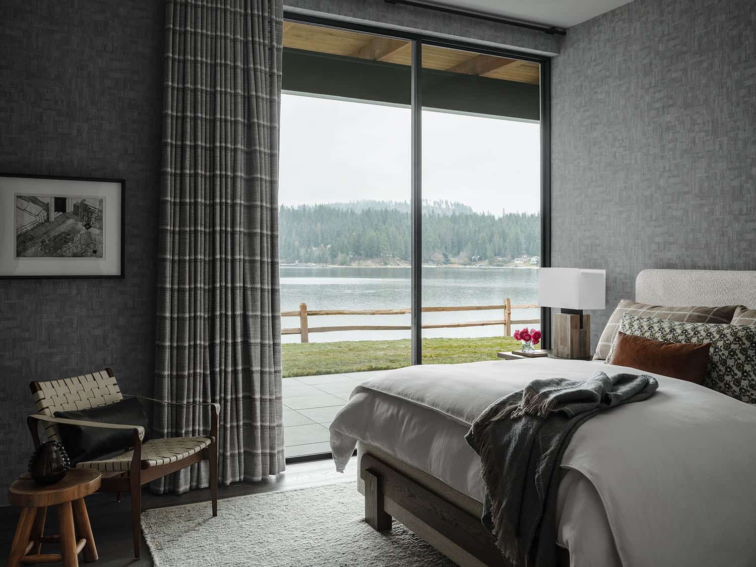 contemporary bedroom with lake views