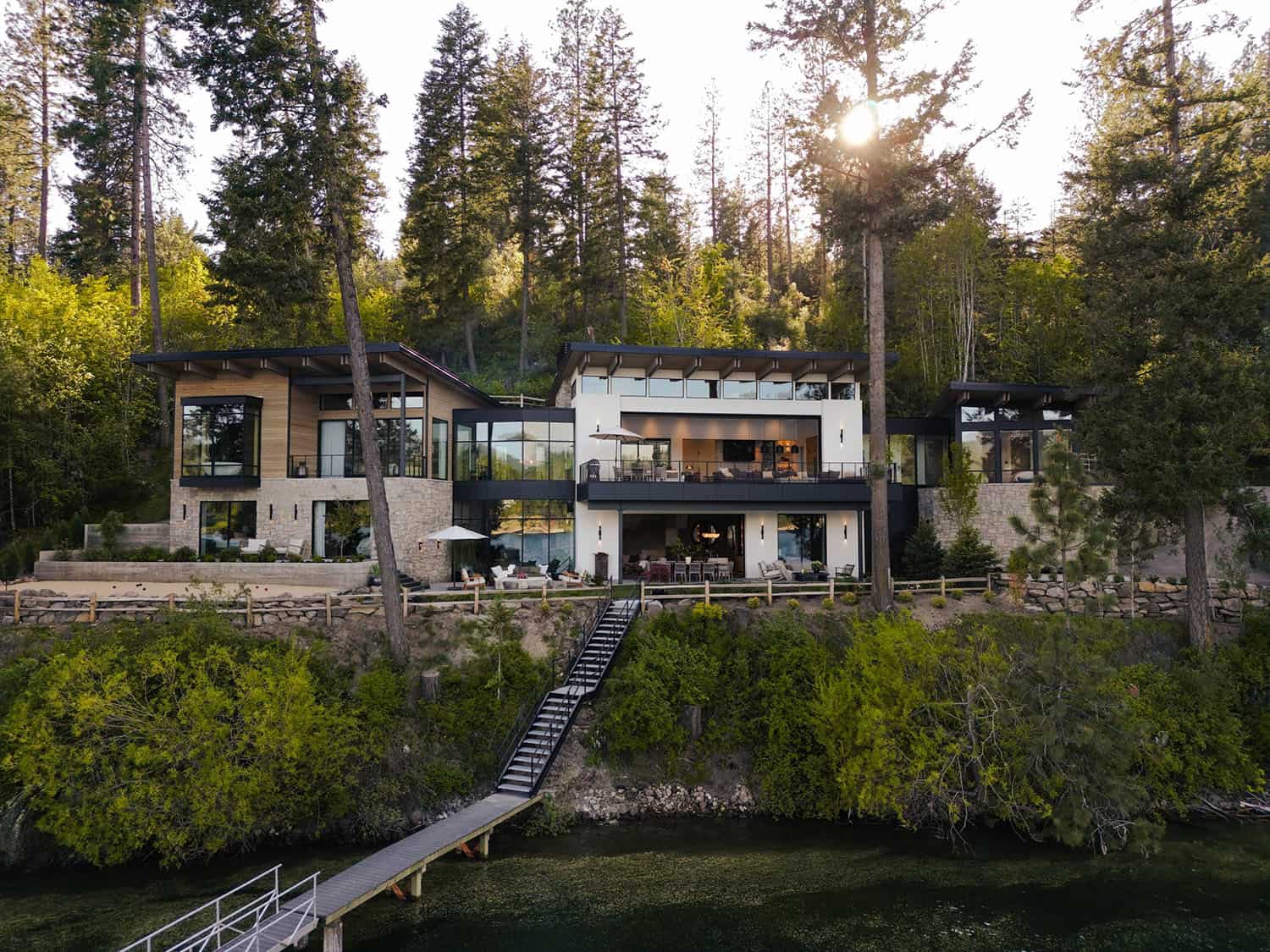 contemporary lake house exterior view from the water