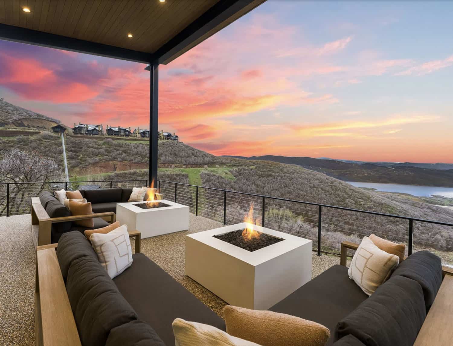 contemporary mountain home patio with a fire pit