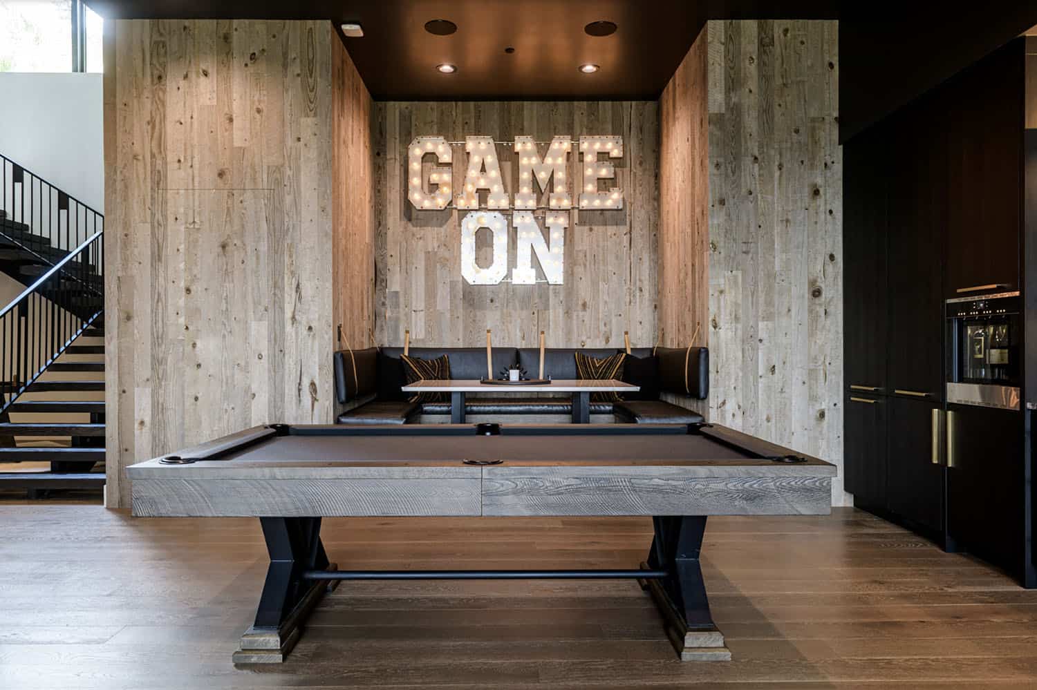 contemporary family room with a pool table