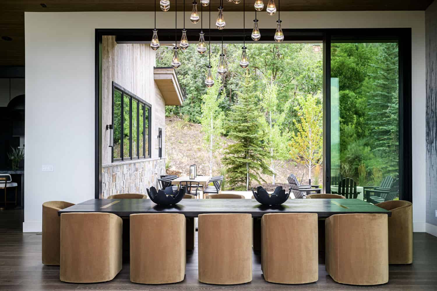 contemporary dining room with sliding glass doors