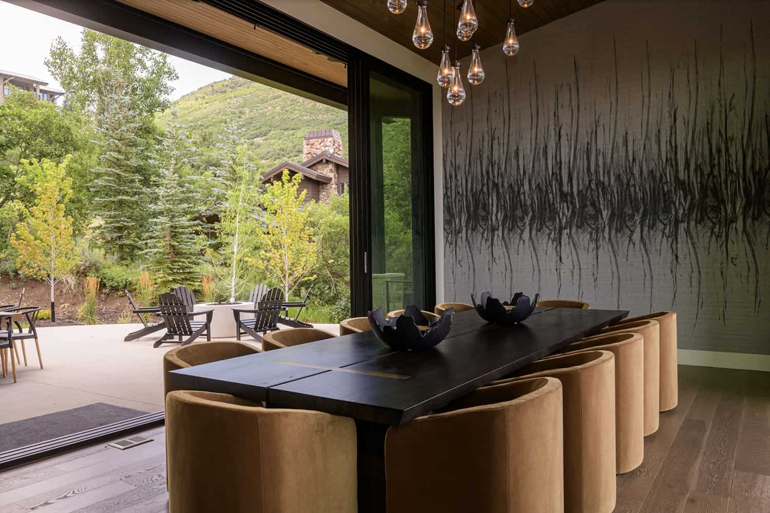 contemporary dining room with sliding glass doors