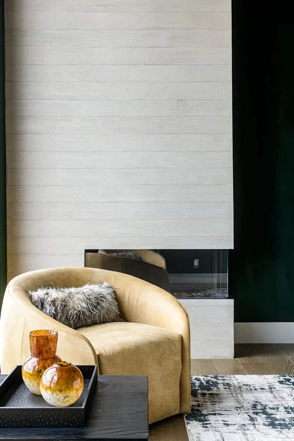 contemporary bedroom with a fireplace