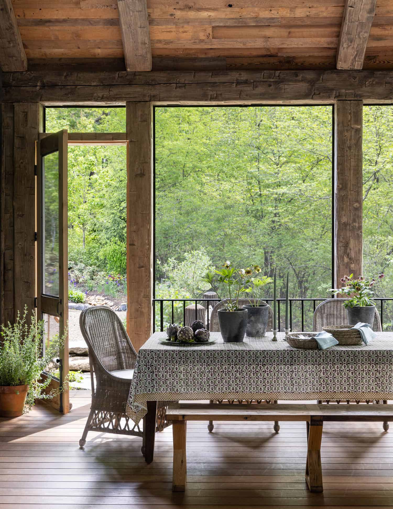 transitional style screened porch with alfresco dining