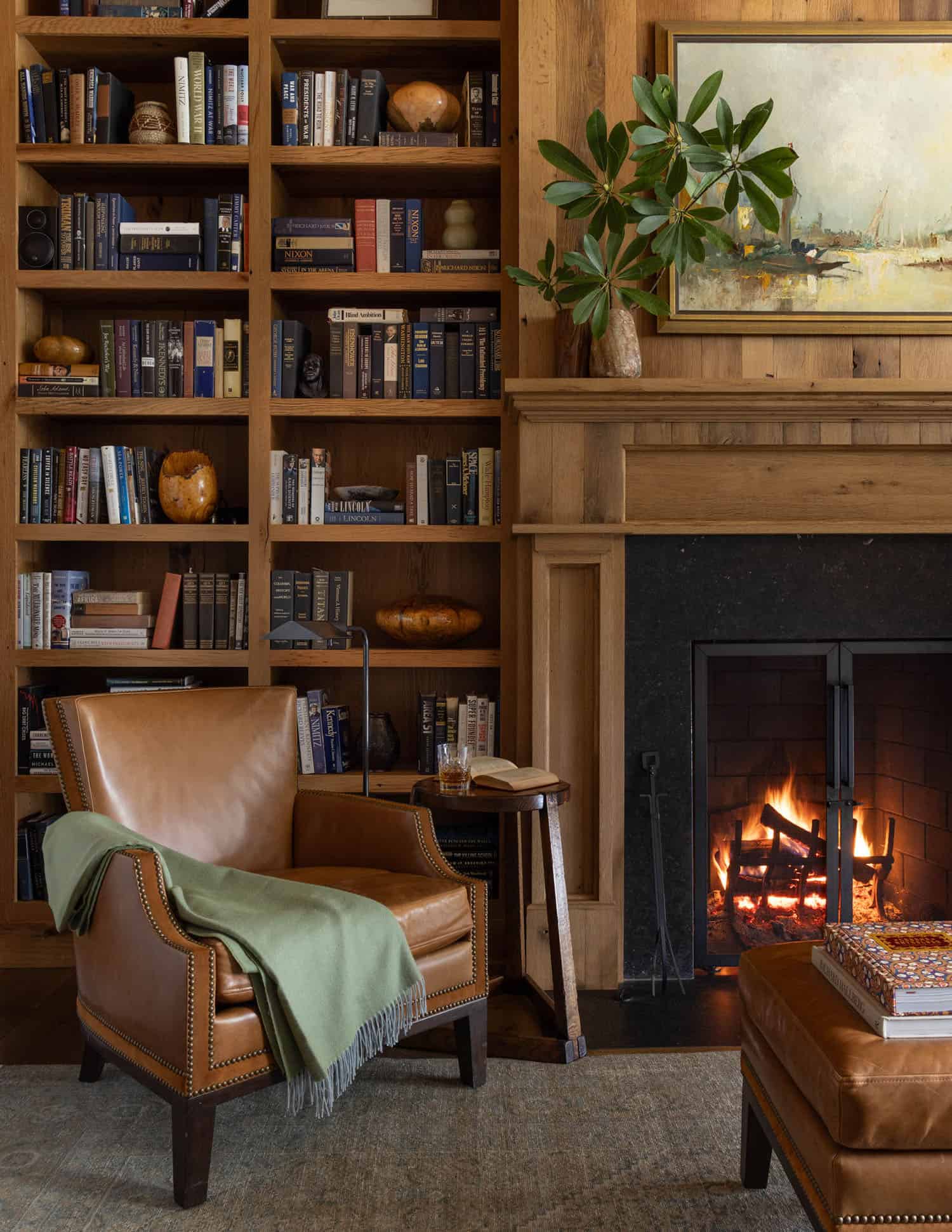transitional style home office with a fireplace