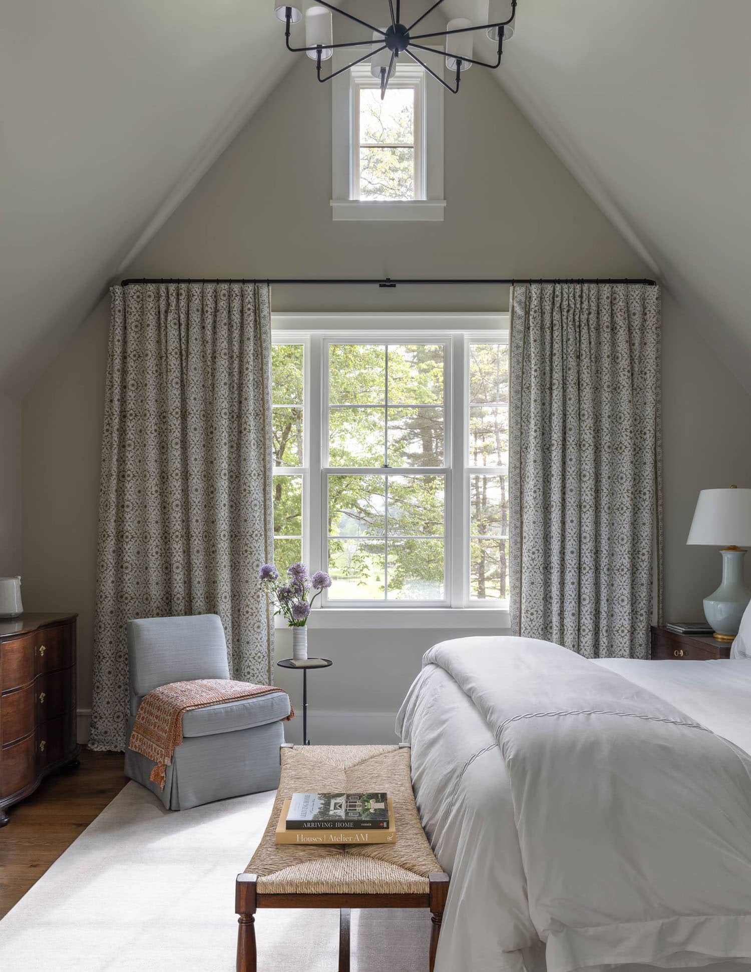transitional style bedroom with a window