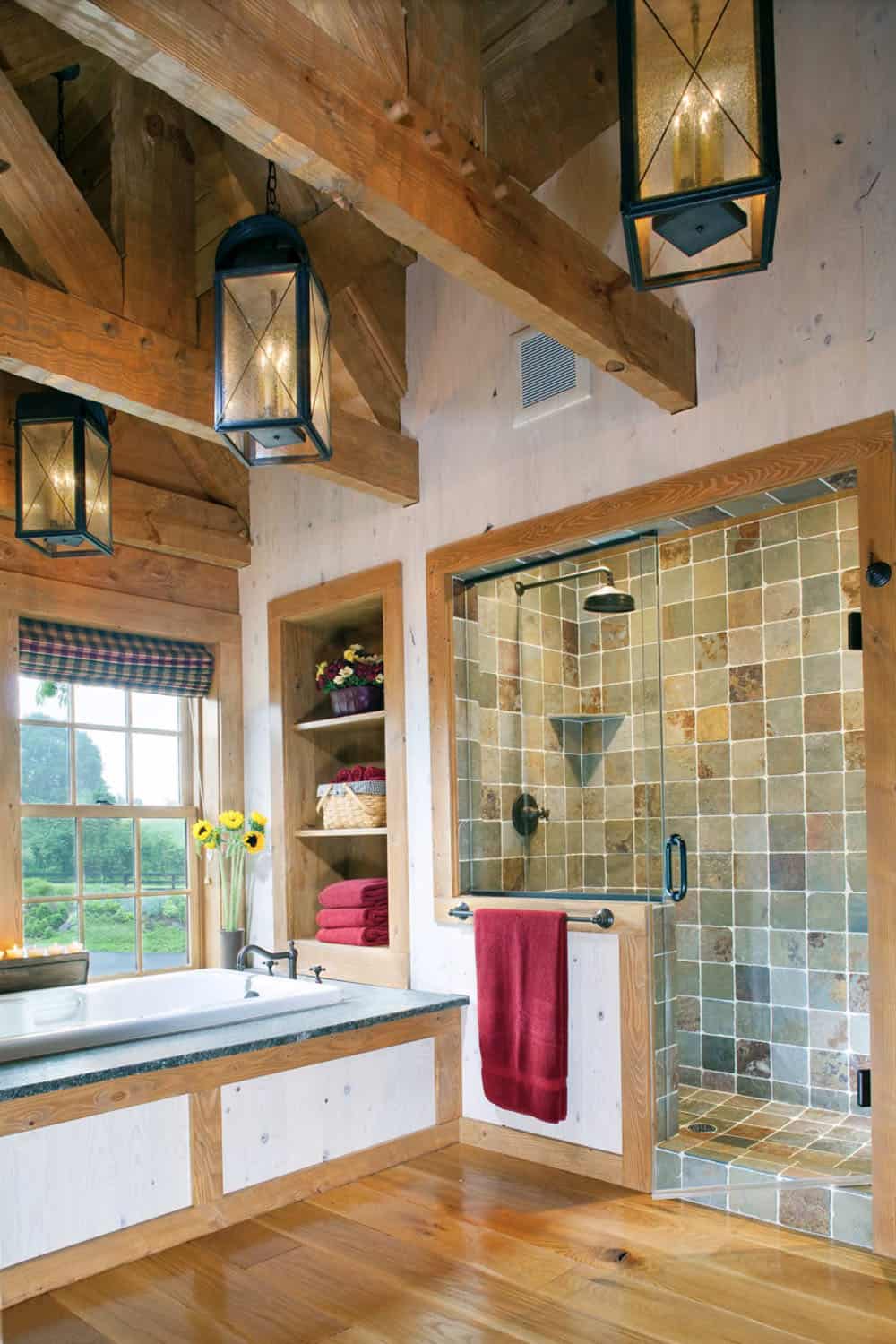 rustic bathroom with a tile shower