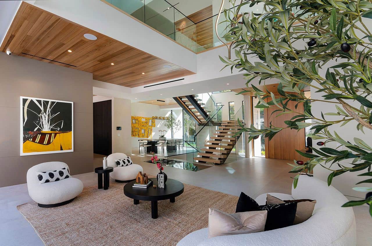 modern home entry with a sitting room