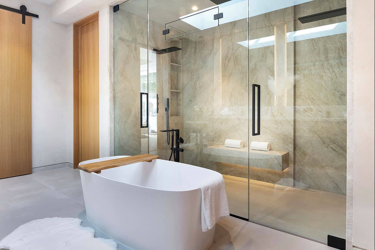 modern bathroom with a shower and freestanding tub