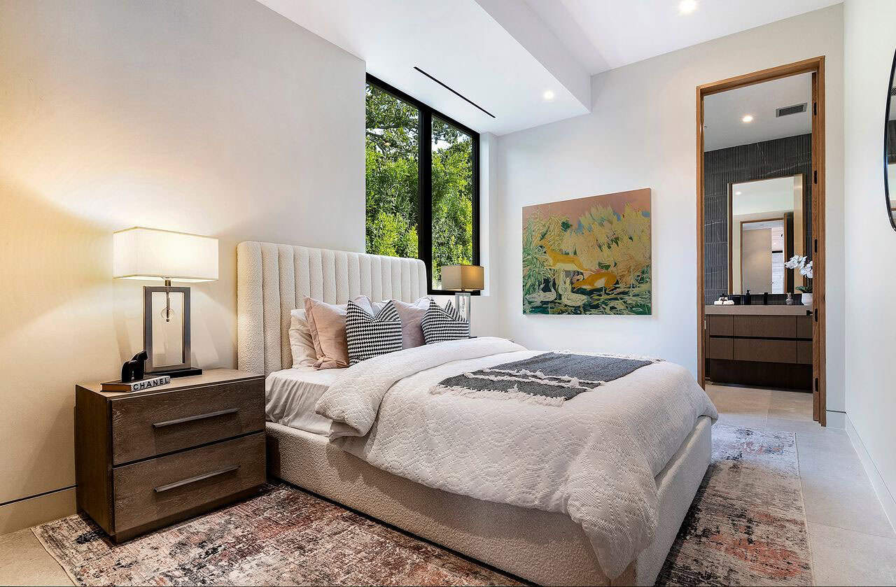 modern bedroom with a large window