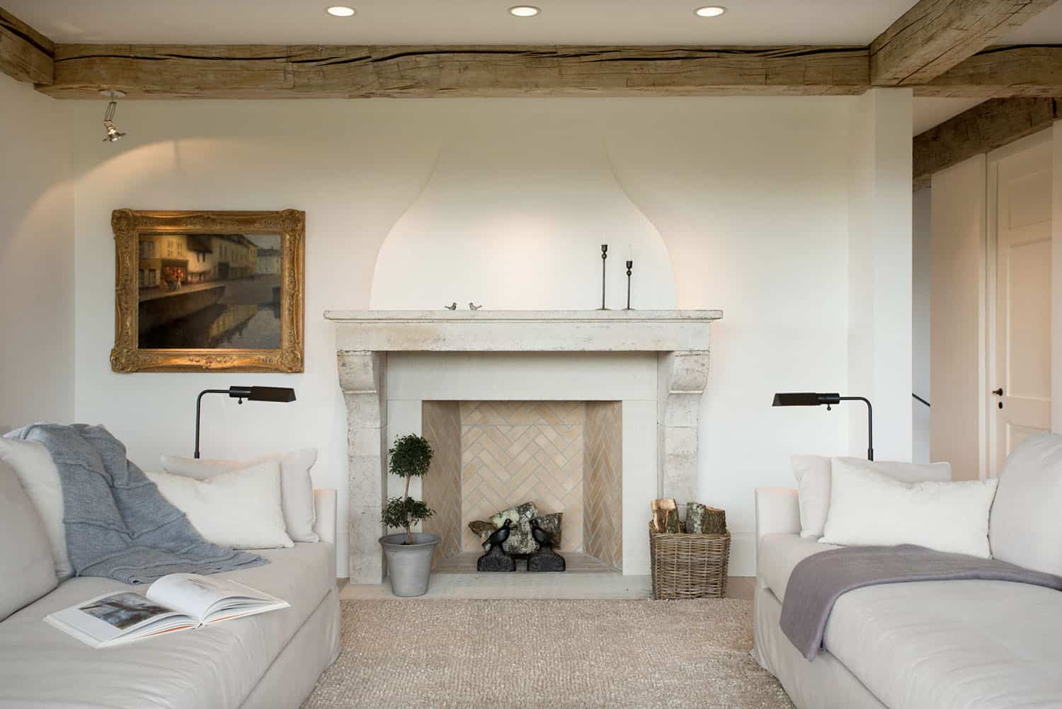 farmhouse style living room with a fireplace