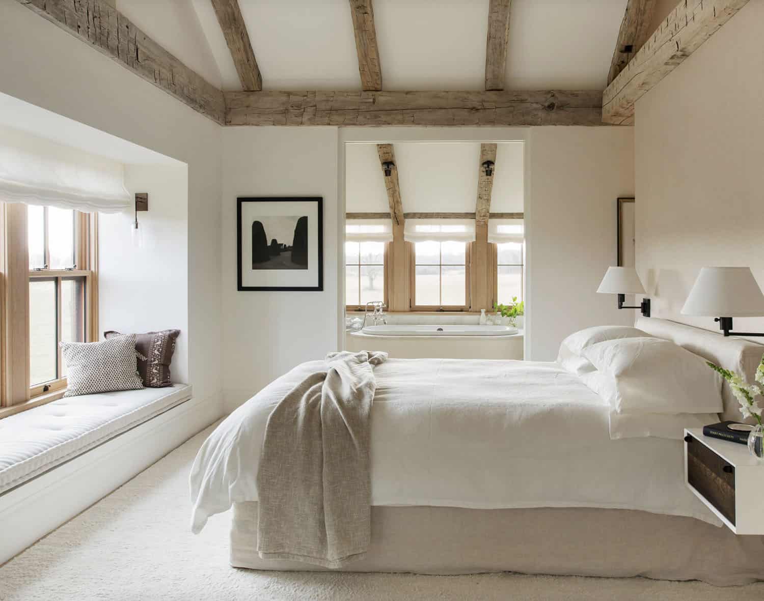 farmhouse style bedroom with a built-in window seat