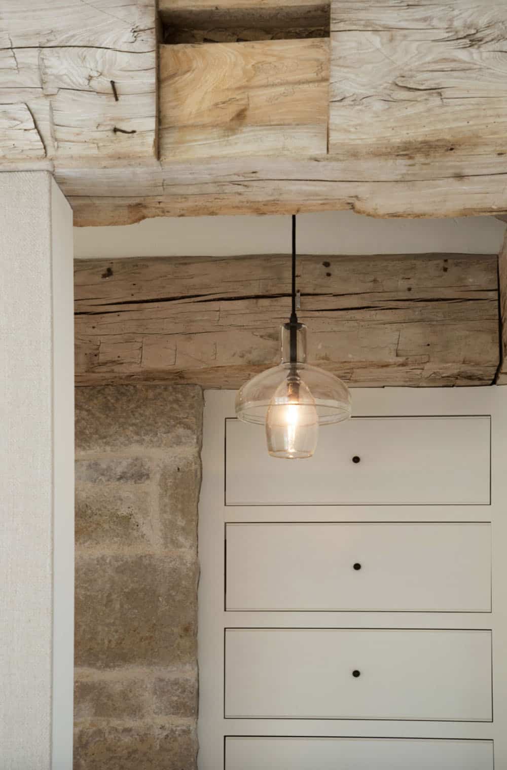 farmhouse style bedroom with built-in storage cabinet