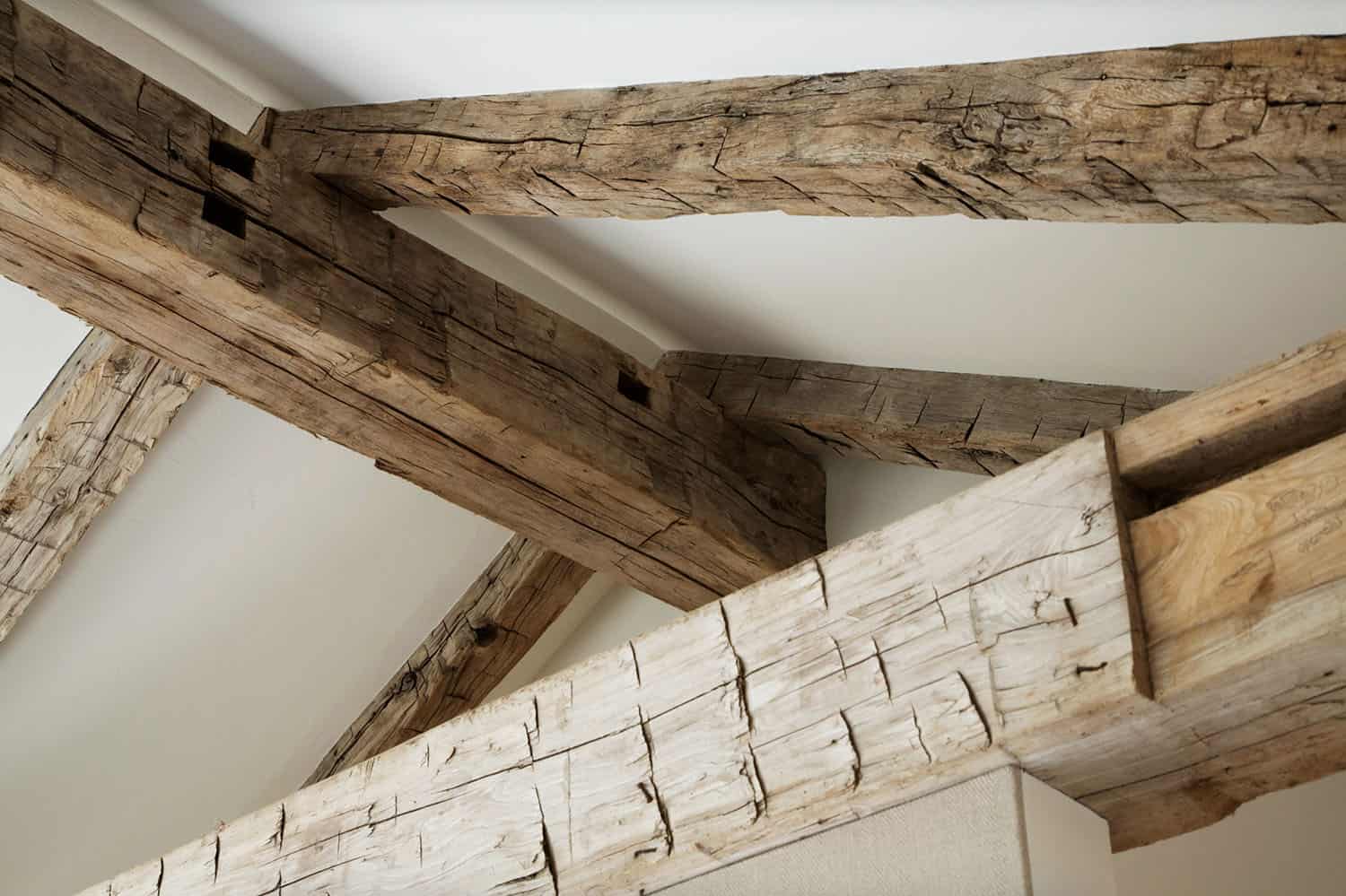 farmhouse style closet with exposed wood ceiling detail