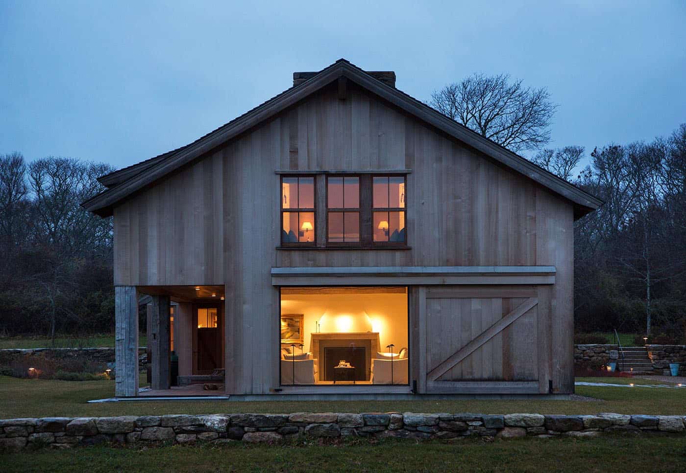 modern barn house exterior at dusk