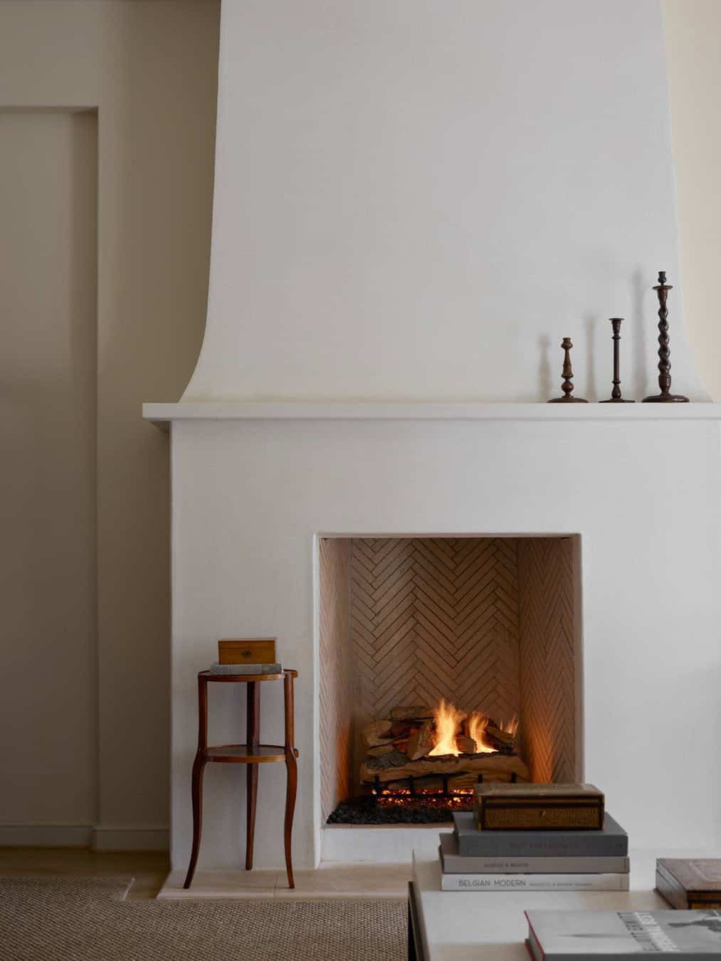 modern english tudor style living room with a fireplace