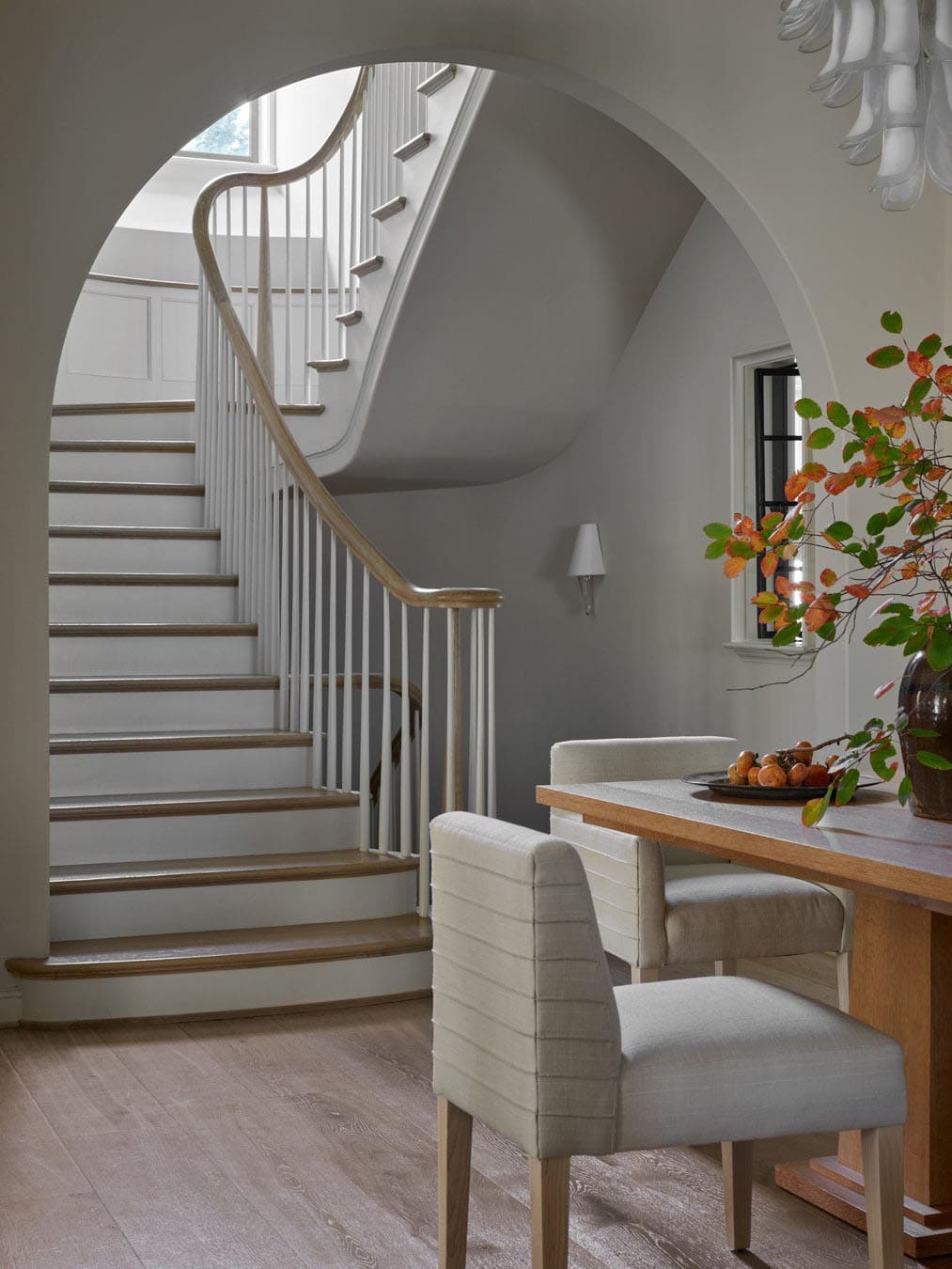 modern english tudor style dining room and staircase