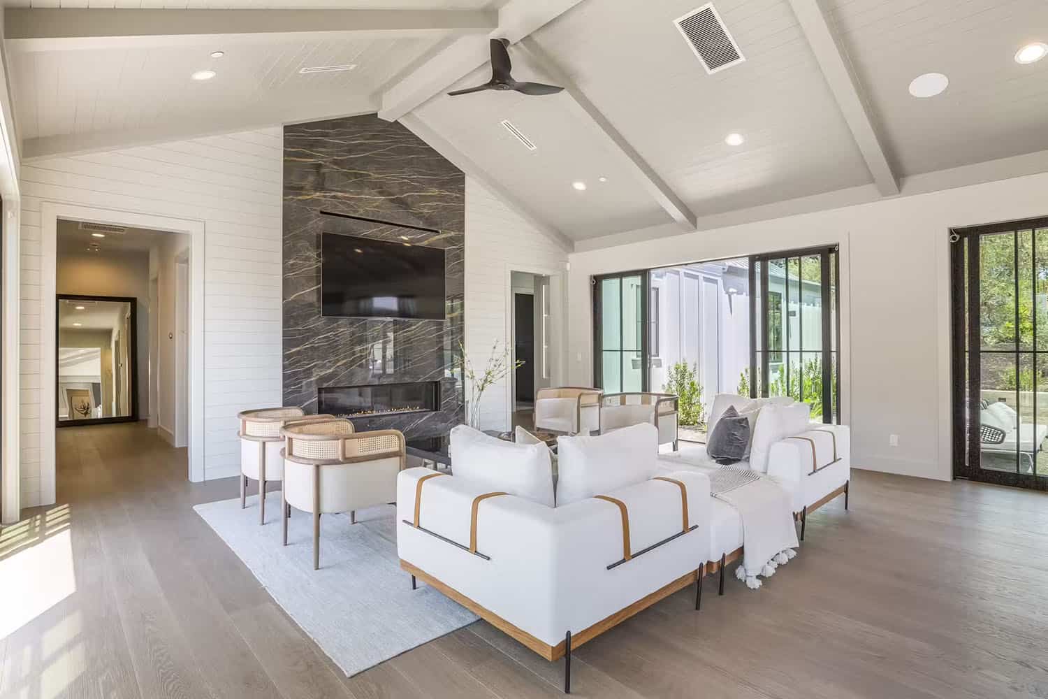 modern farmhouse style living room with a fireplace