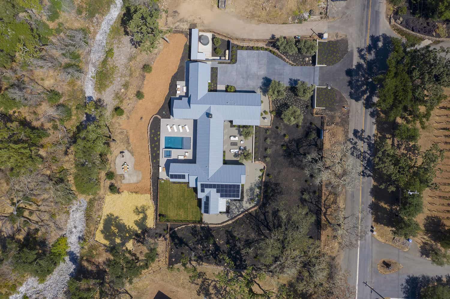modern farmhouse style home exterior aerial view