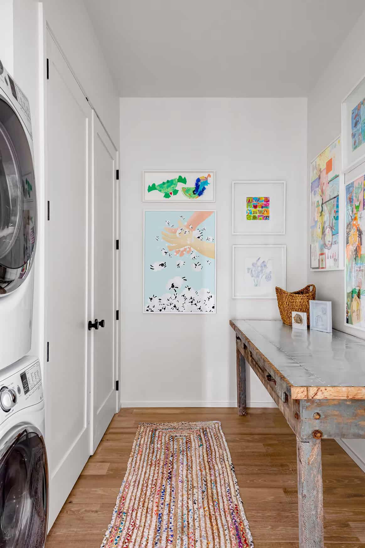 modern farmhouse style laundry room with stacked washer and dryer