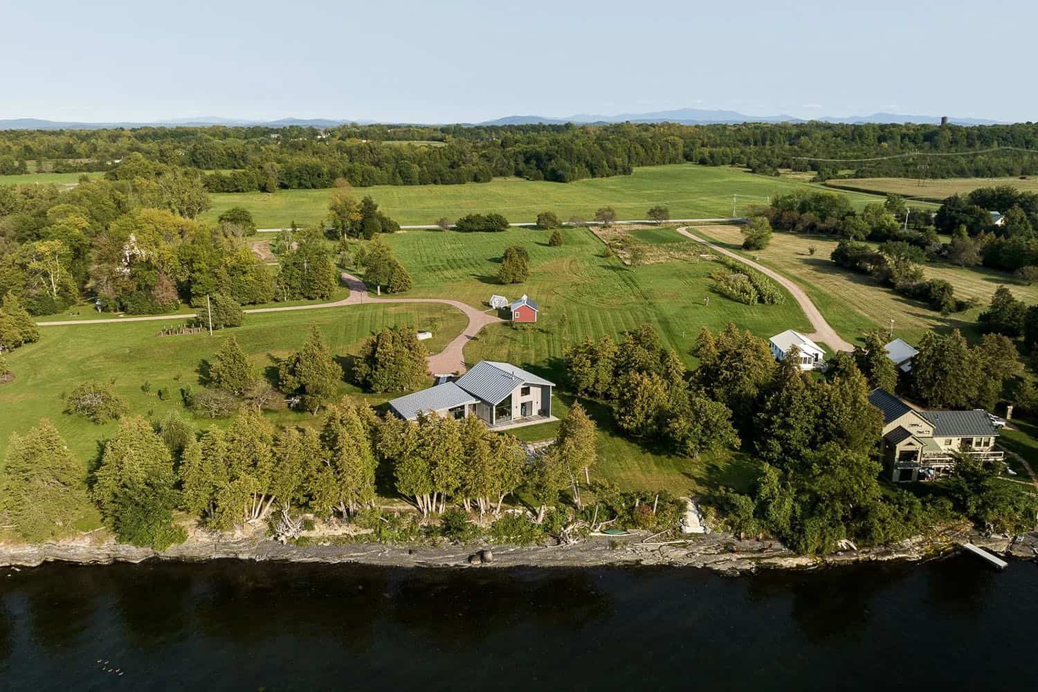 modern lake house exterior aerial view