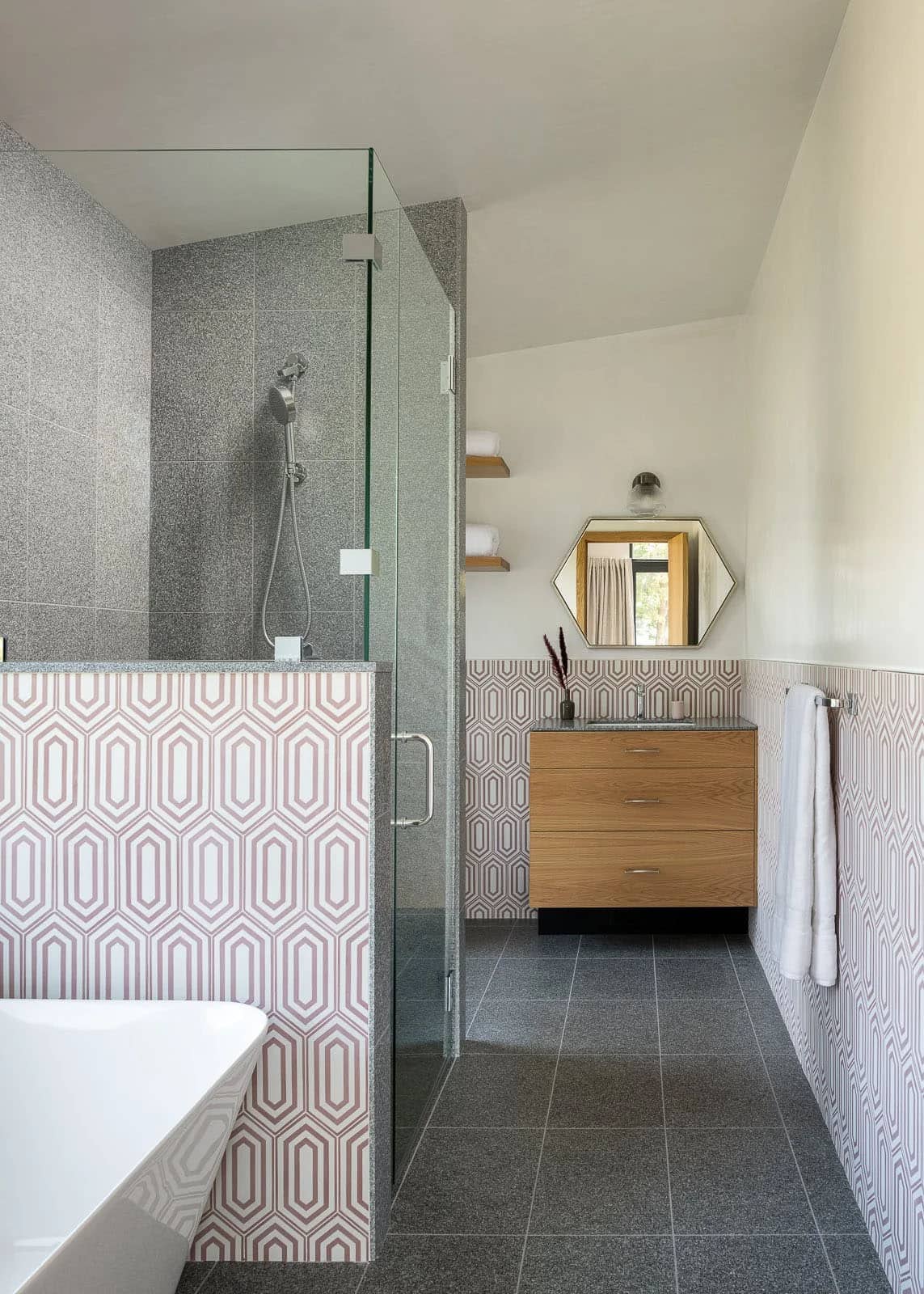 modern bathroom with a soaking tub and glass shower