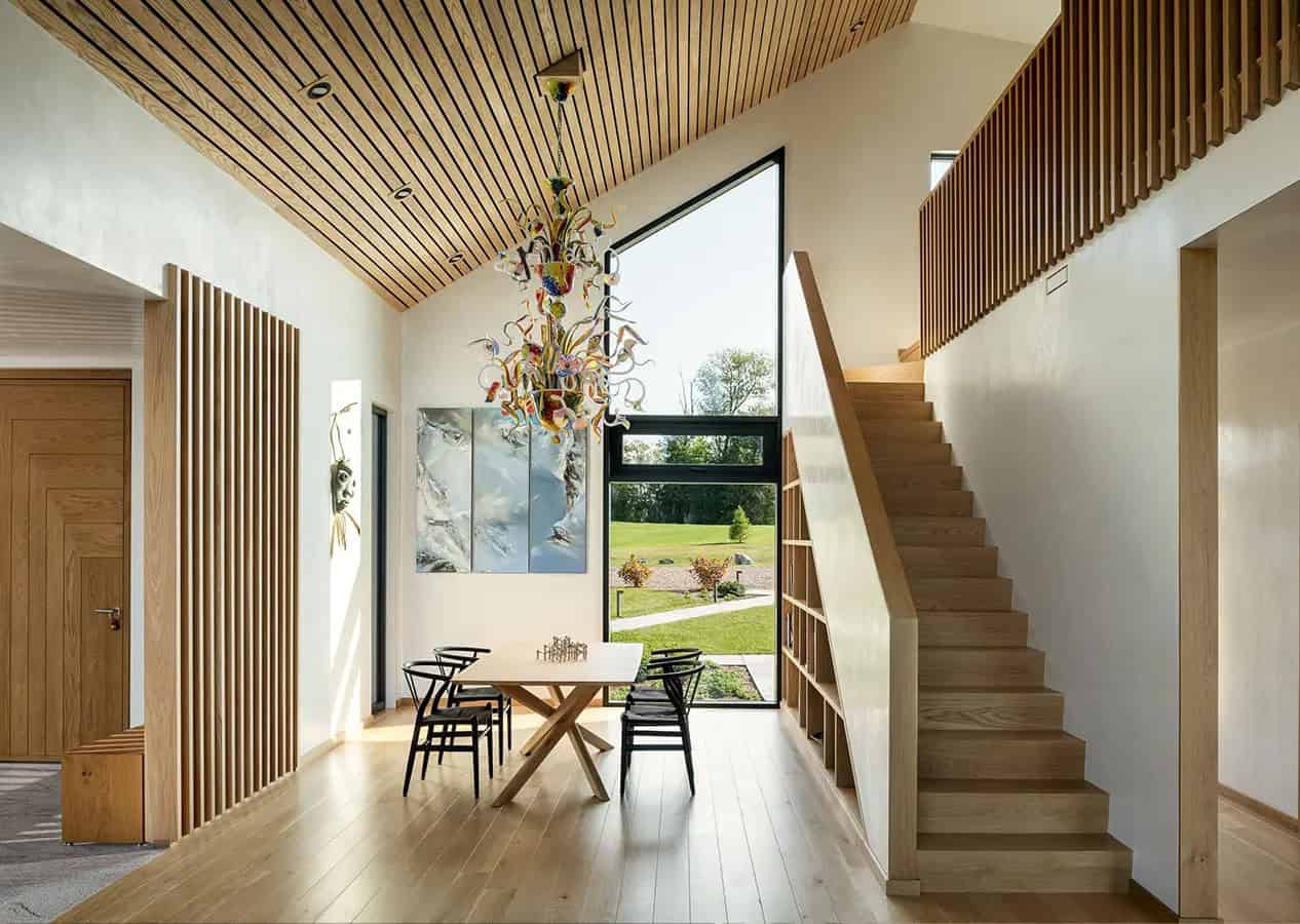 modern dining room with a staircase