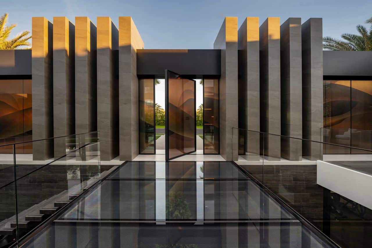 modern luxury house entry with a glass bridge