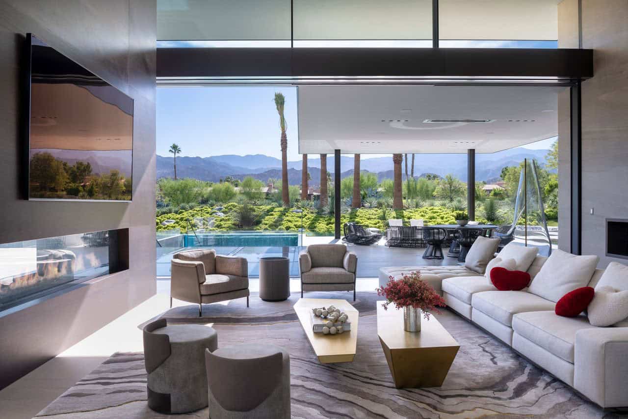 modern living room with a fireplace and a view
