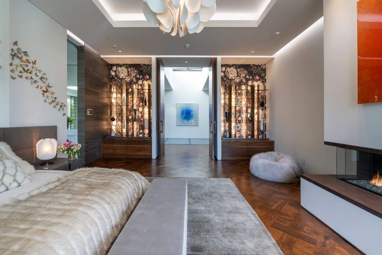 modern bedroom with a chandelier