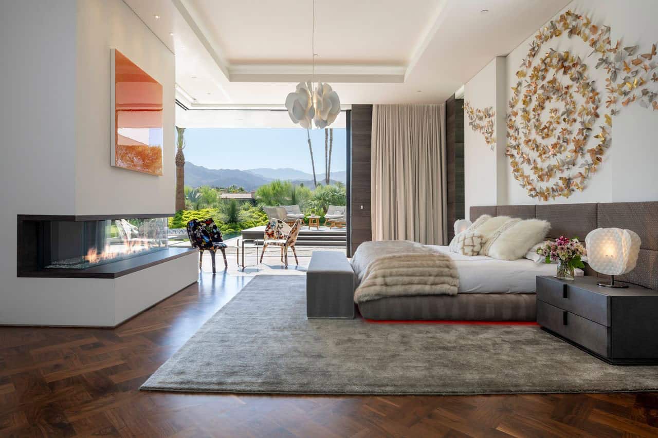 modern bedroom with a fireplace