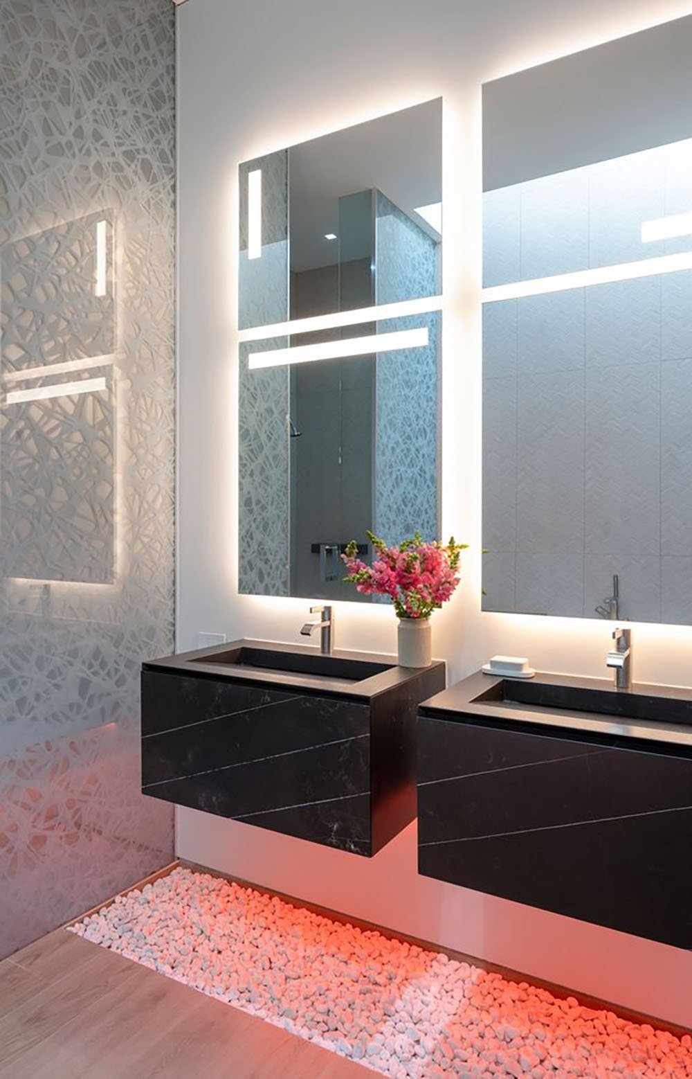 A modern bathroom with two sinks