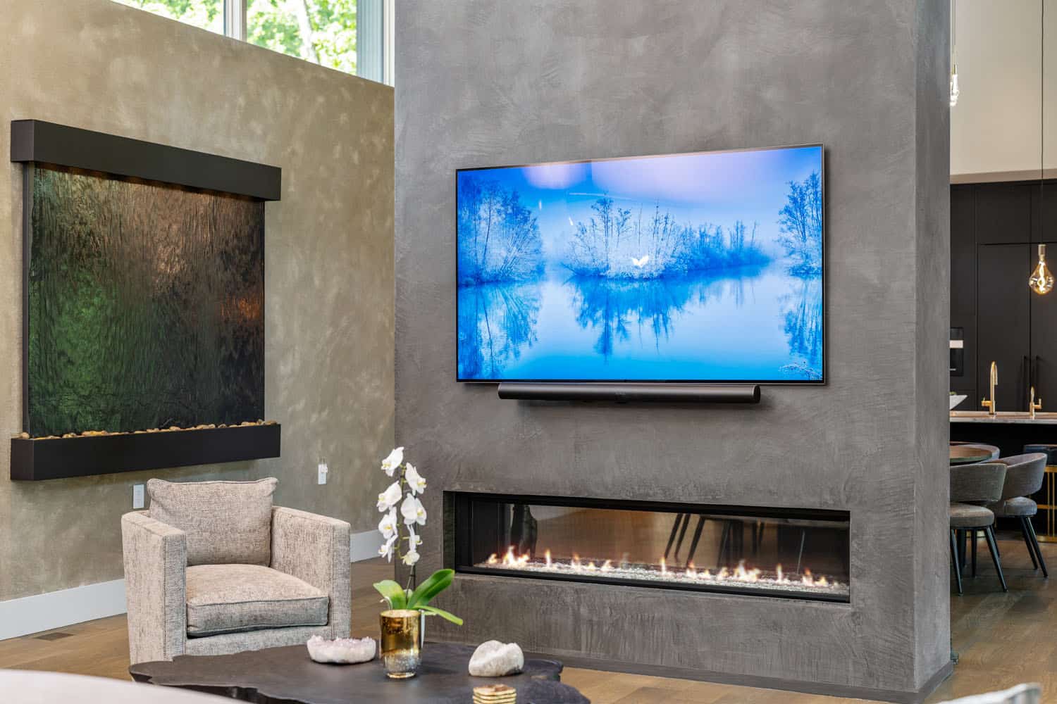 modern living room with a dual-sided fireplace