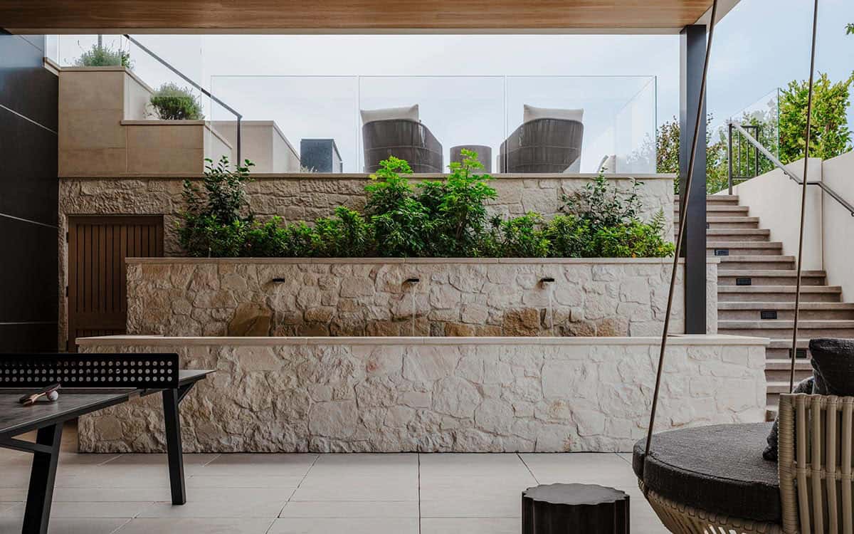 organic modern home exterior with a patio