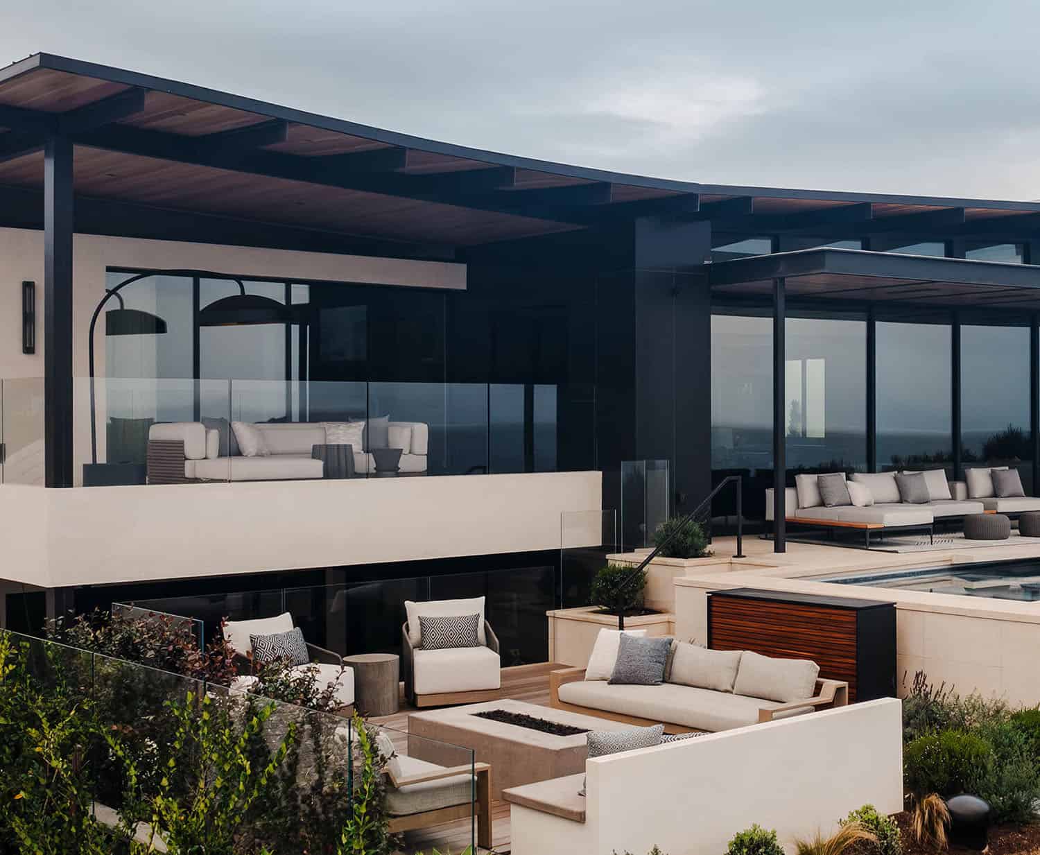 organic modern home exterior with a patio