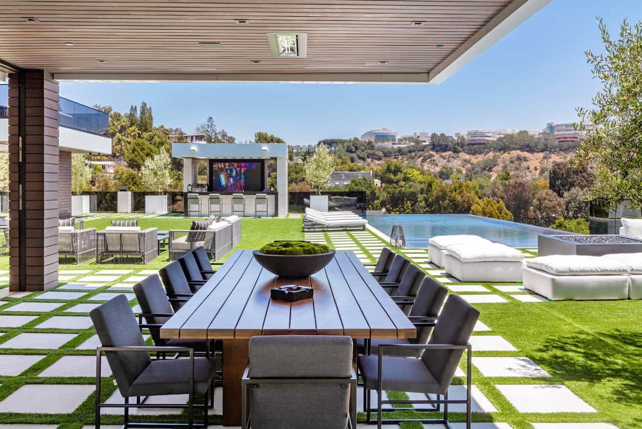 modern house exterior with a covered patio and alfresco dining