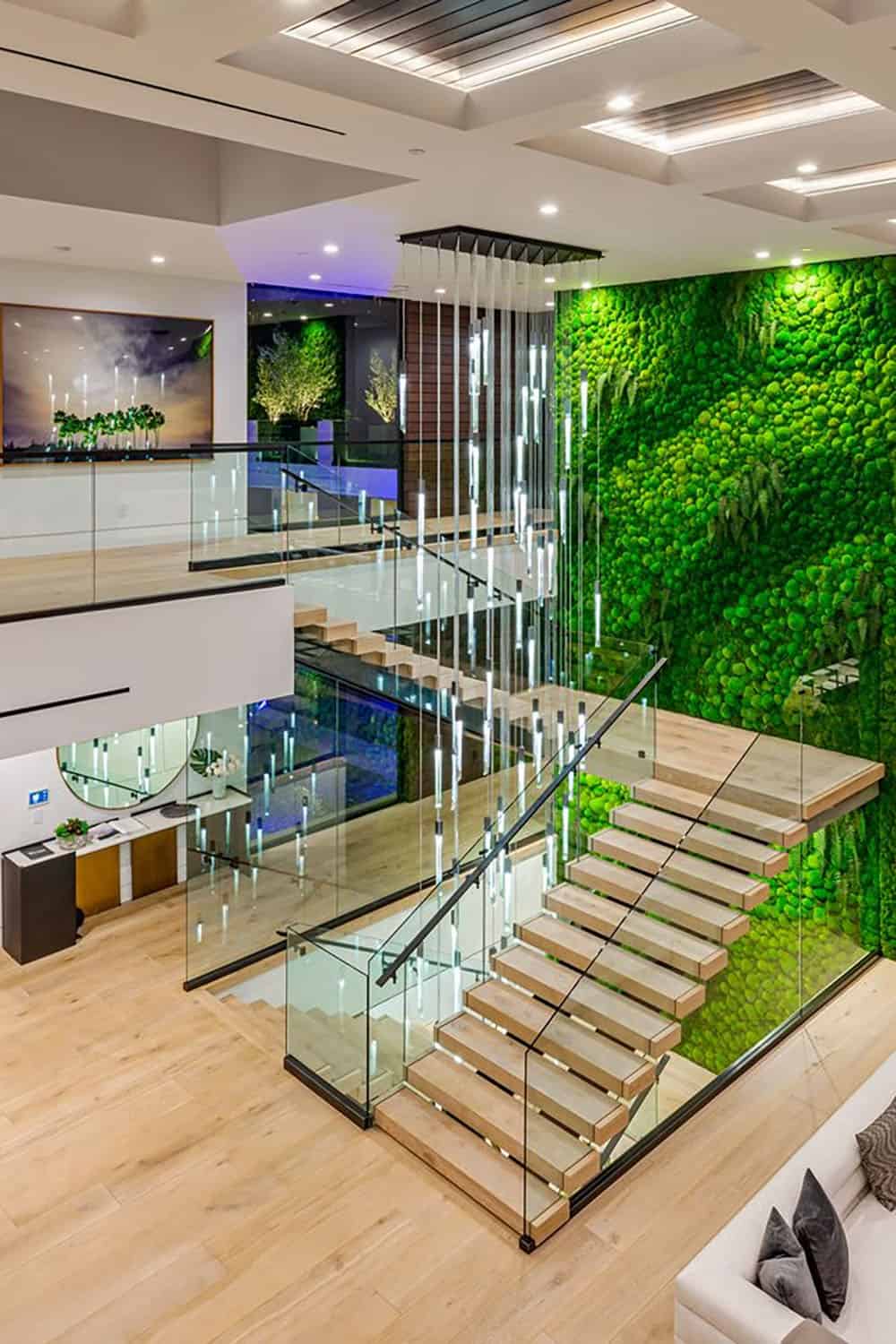 modern staircase with a green wall