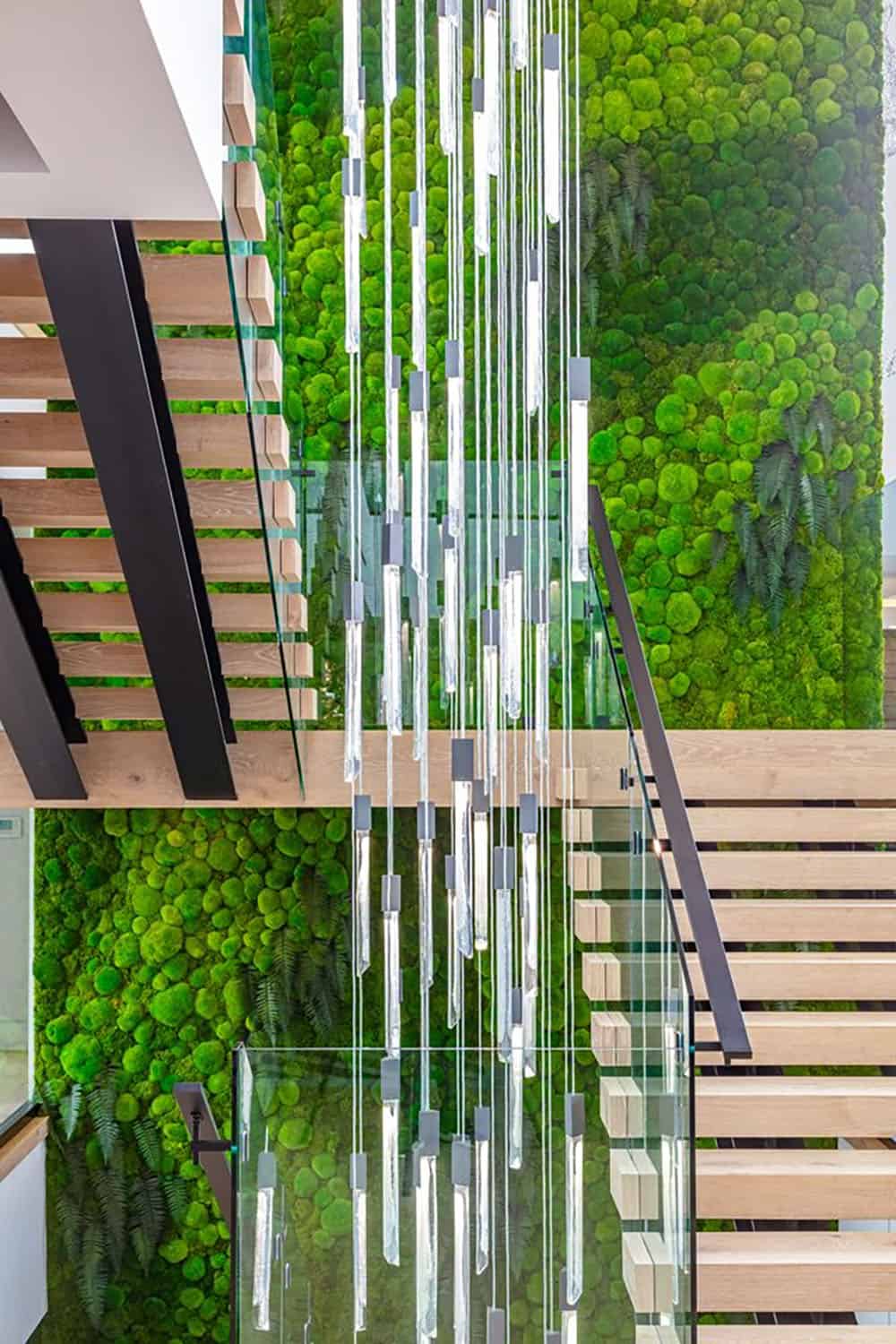 modern staircase with a green wall