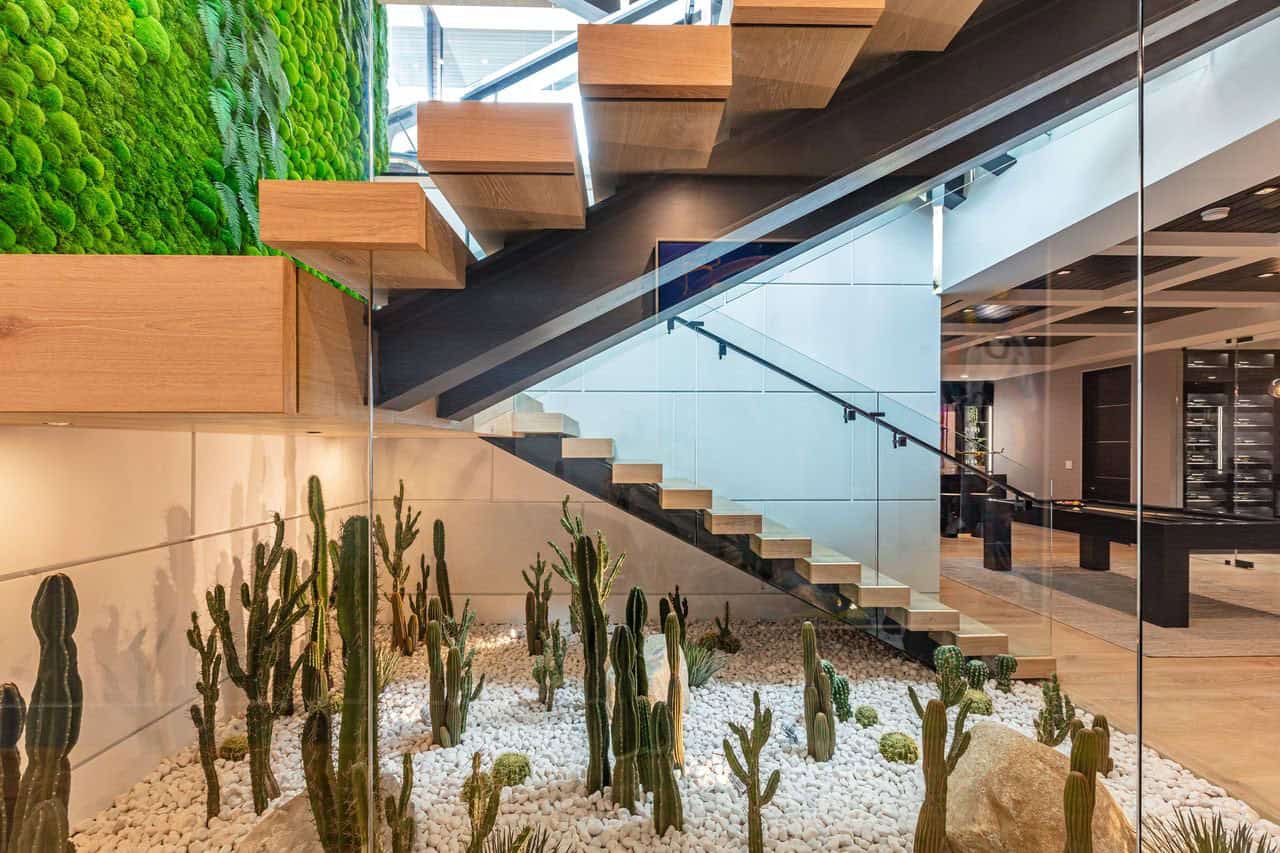 modern staircase with a green wall
