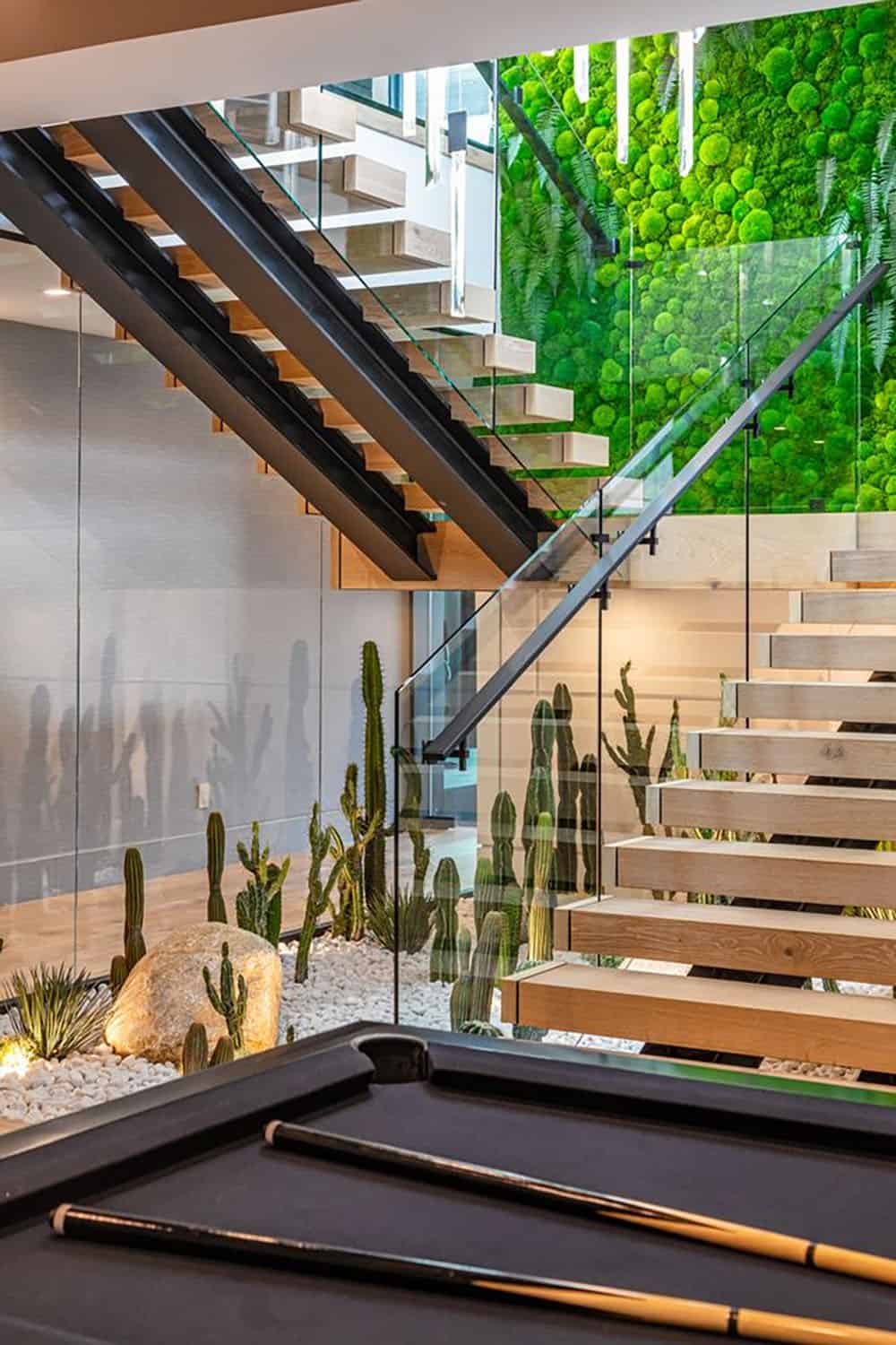 modern staircase with a green wall
