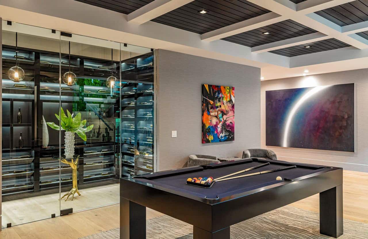 modern game room with a pool table