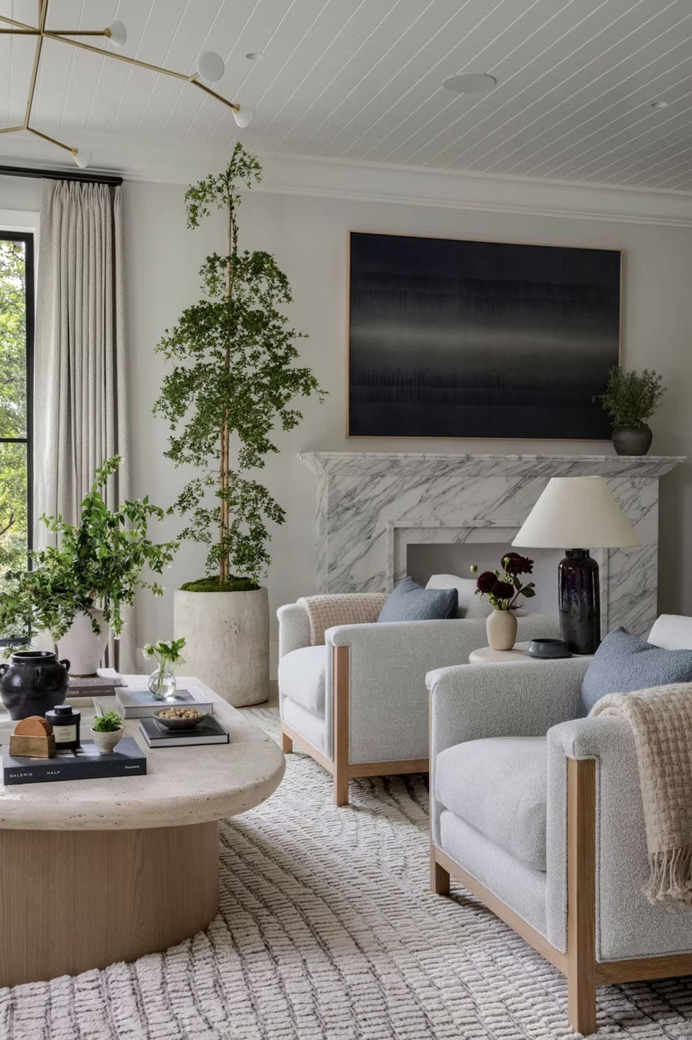 transitional style living room with a fireplace