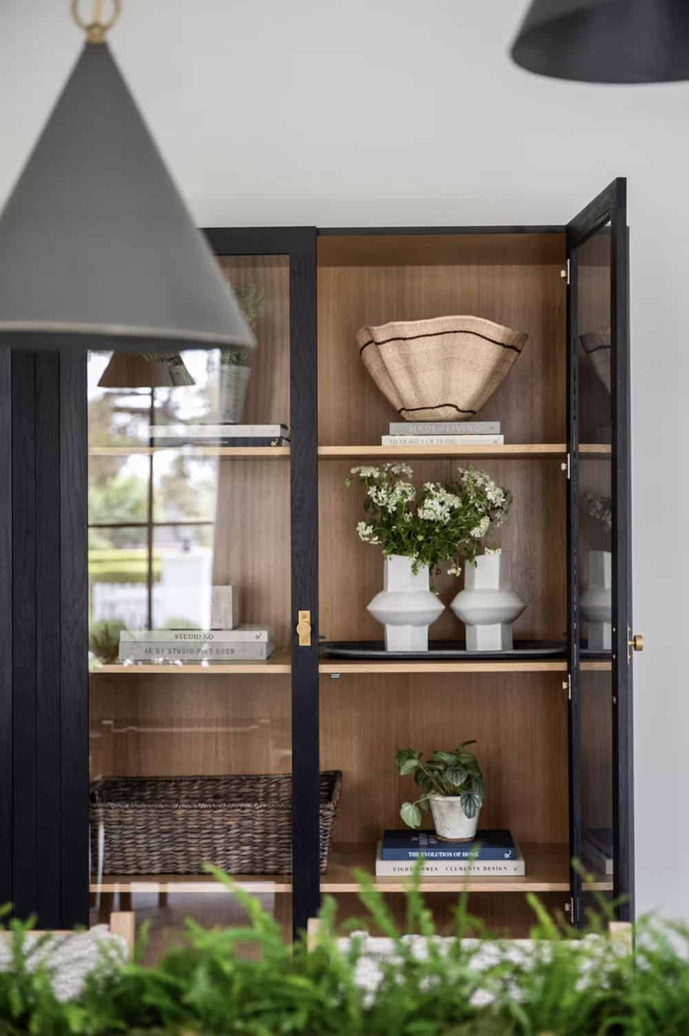 transitional style dining room with a built-in hutch