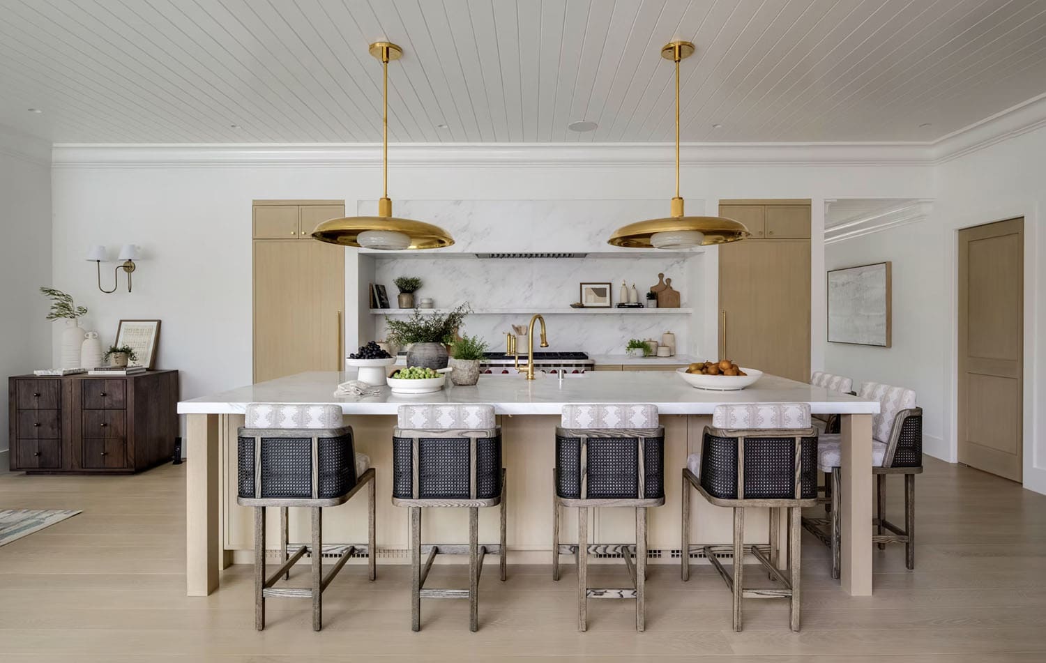 transitional style kitchen with large pendant lights