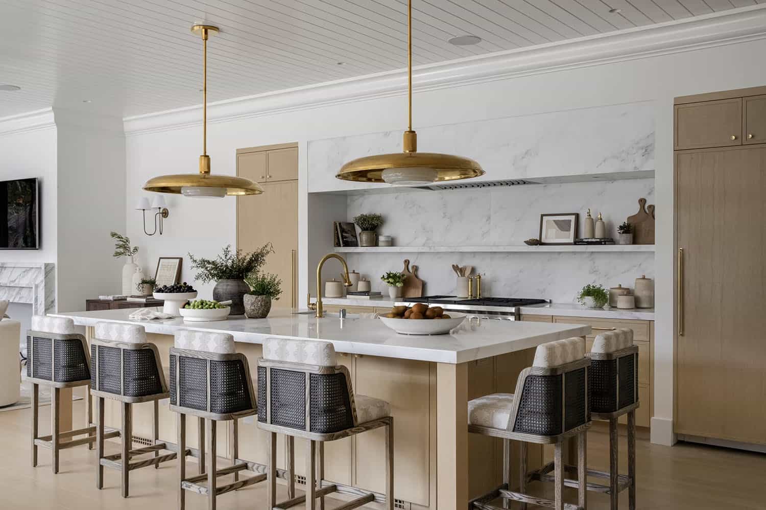transitional style kitchen with large pendant lights