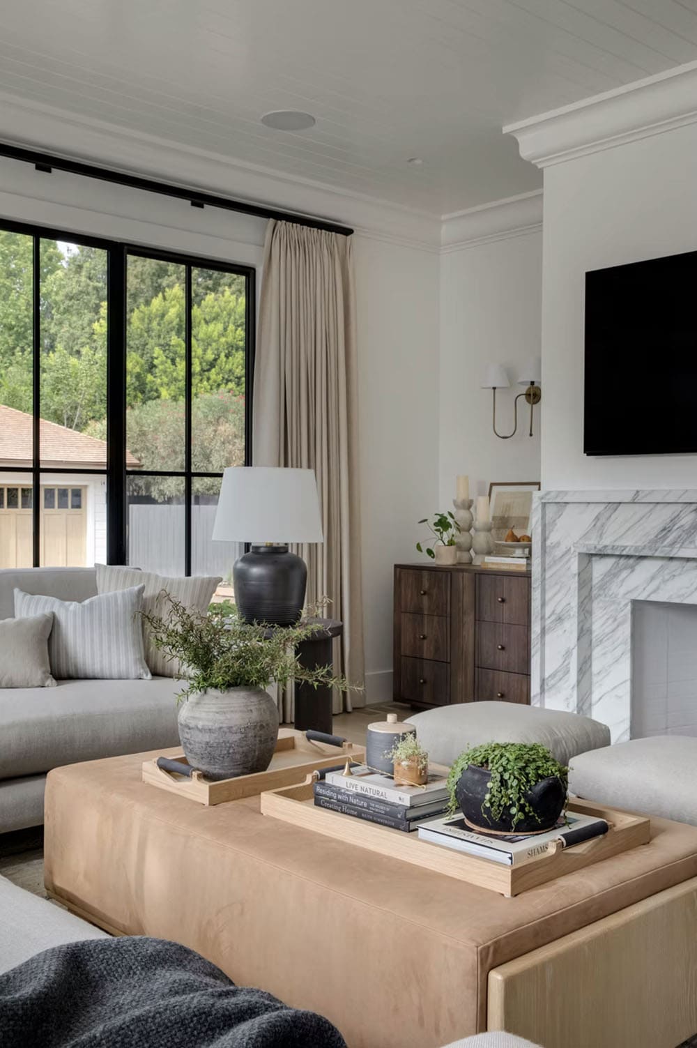 transitional style living room with a fireplace