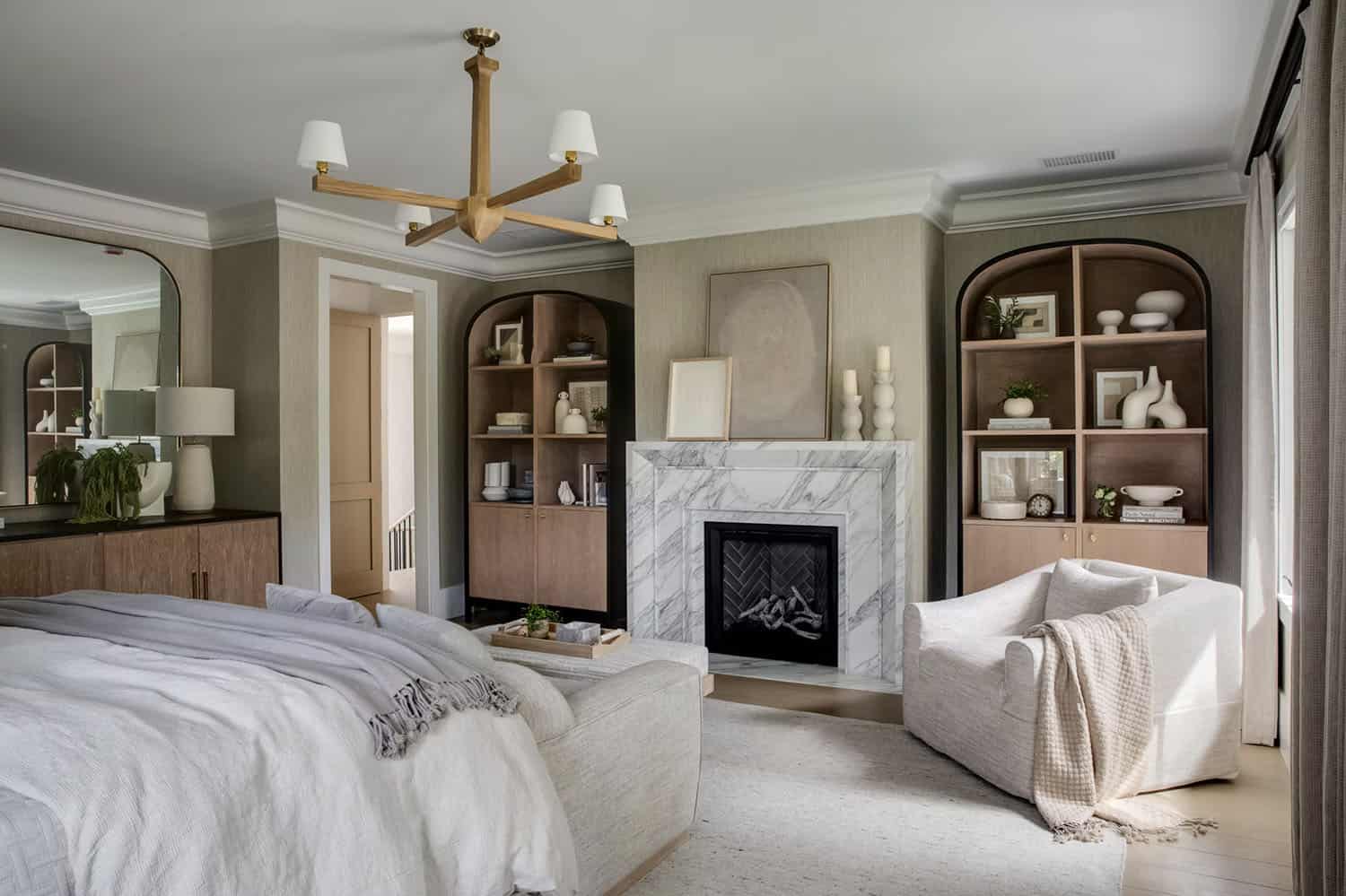transitional style bedroom with a fireplace