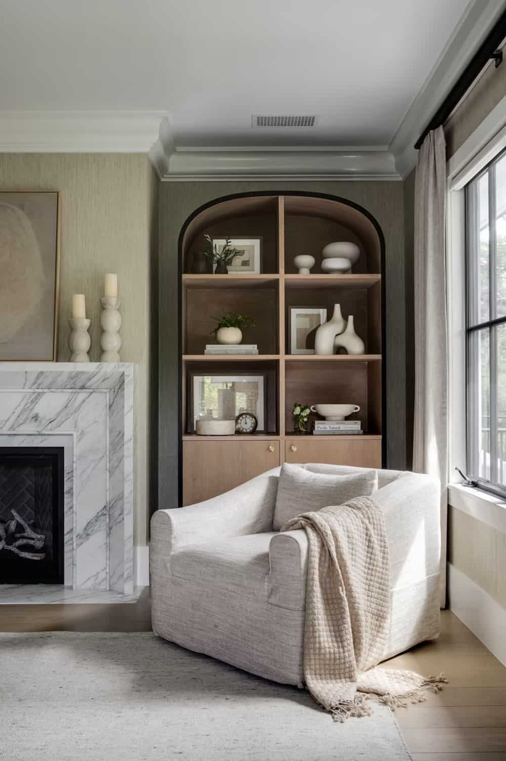 transitional style bedroom with a fireplace